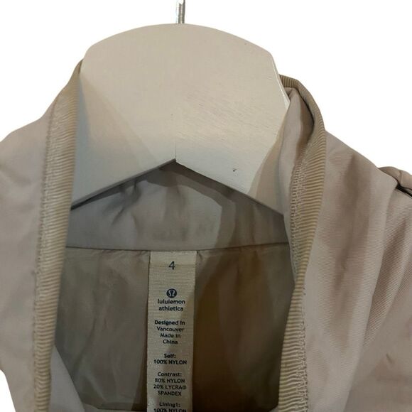 Lululemon Out and About Peplum water repellent cream Jacket Ecru size 4 with hoo - Picture 11 of 11